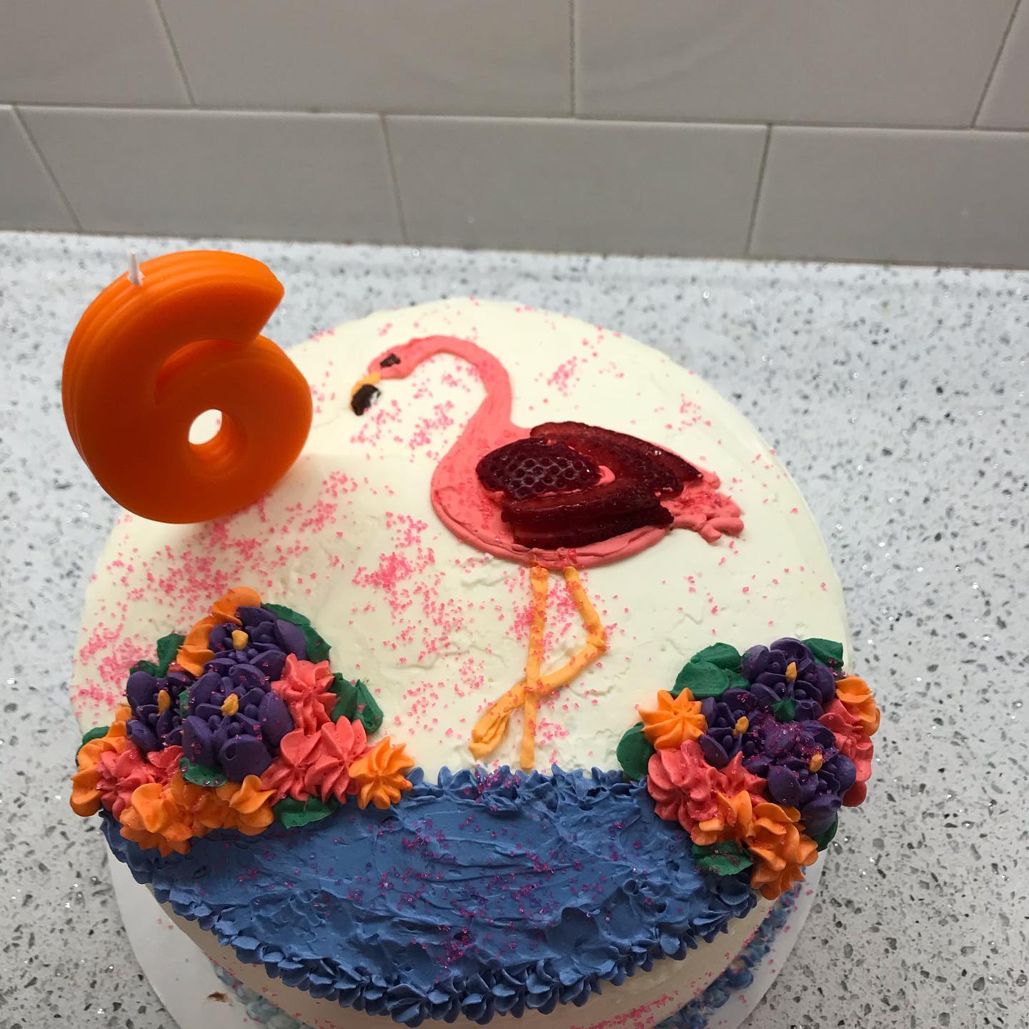 Custom event cake, 9" round double-layered, varying amounts of decoration